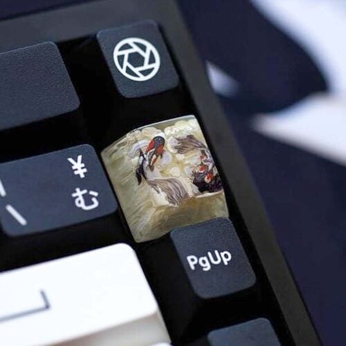 Artistic koi fish painting on custom keyboard keycap.